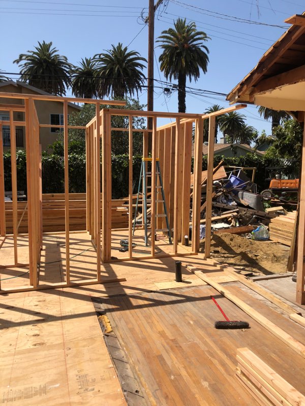 Outdoor area is under construction with wooden flooring