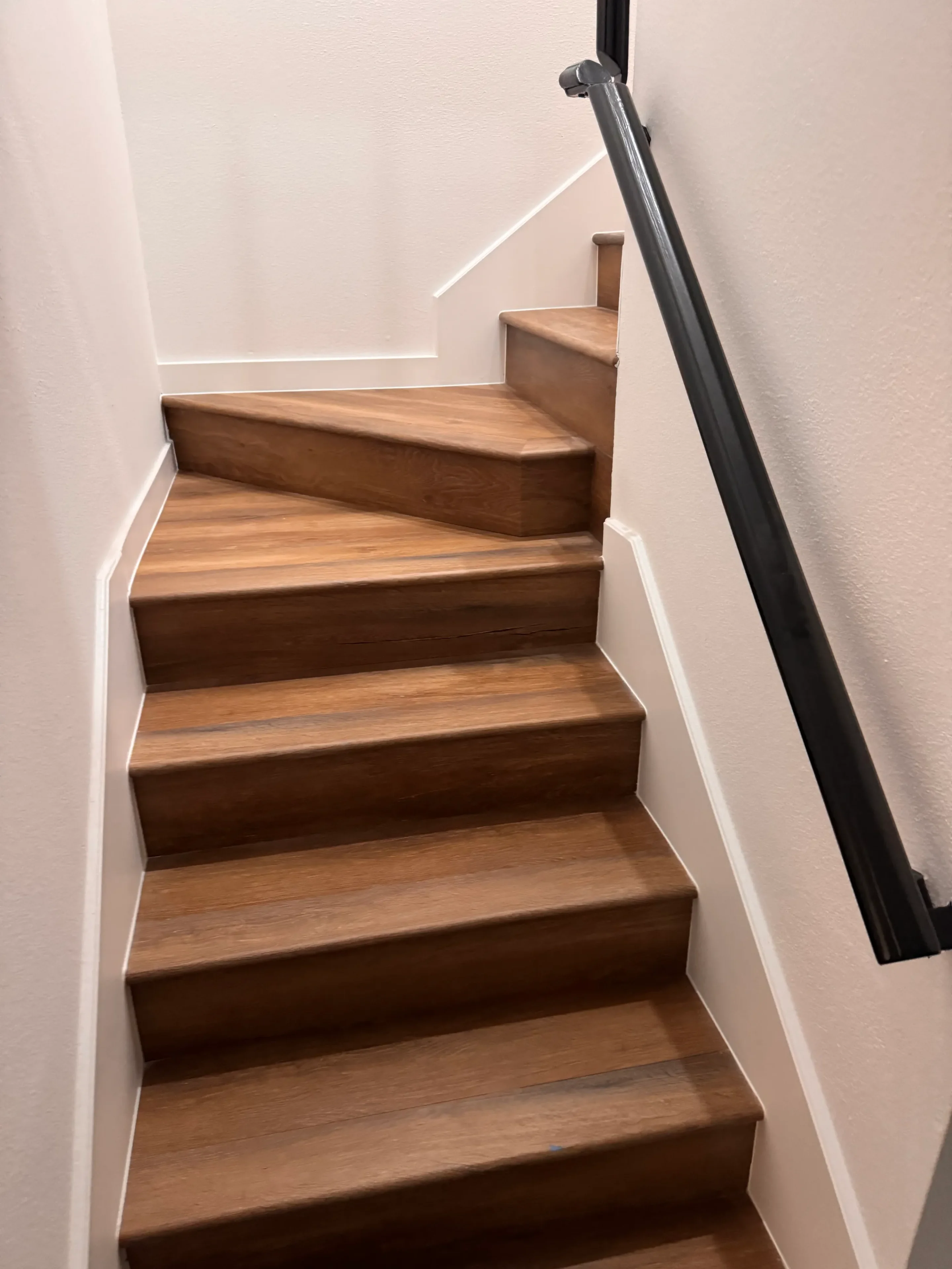 Modern staircase with wooden steps