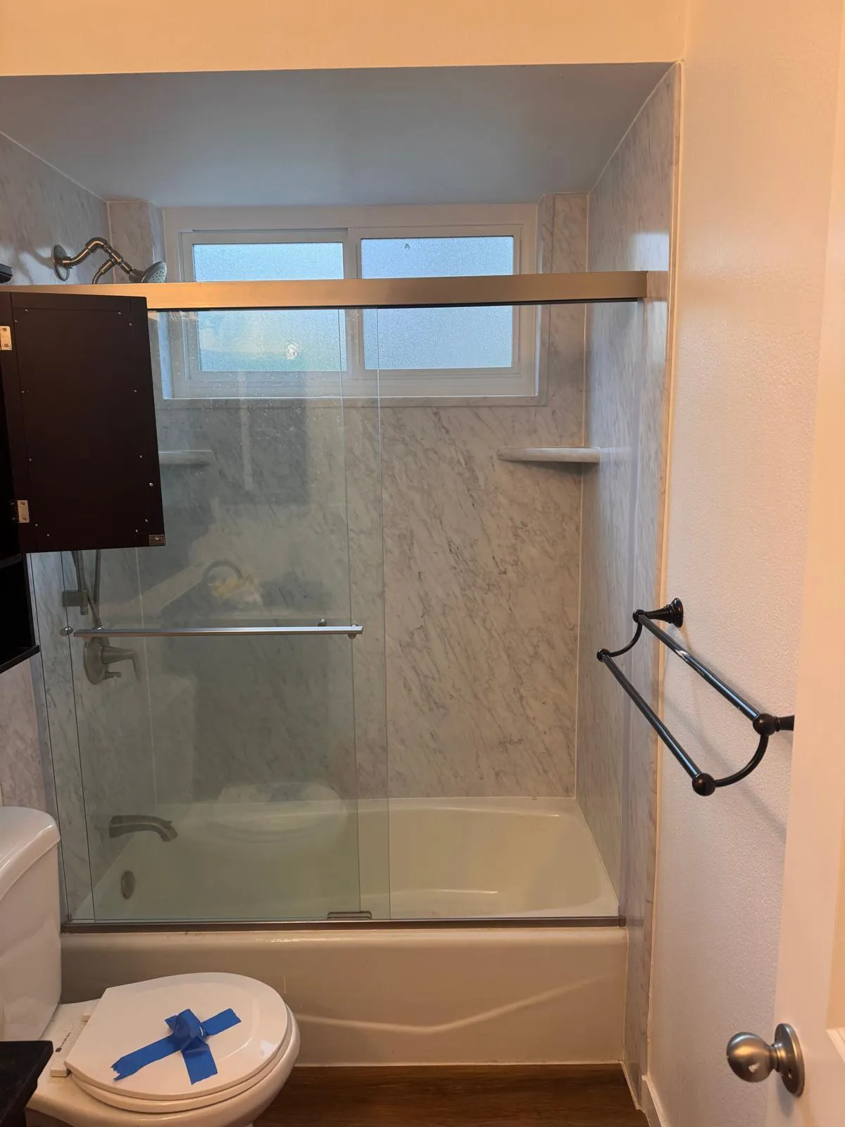 Compact bathroom with shower and toilet